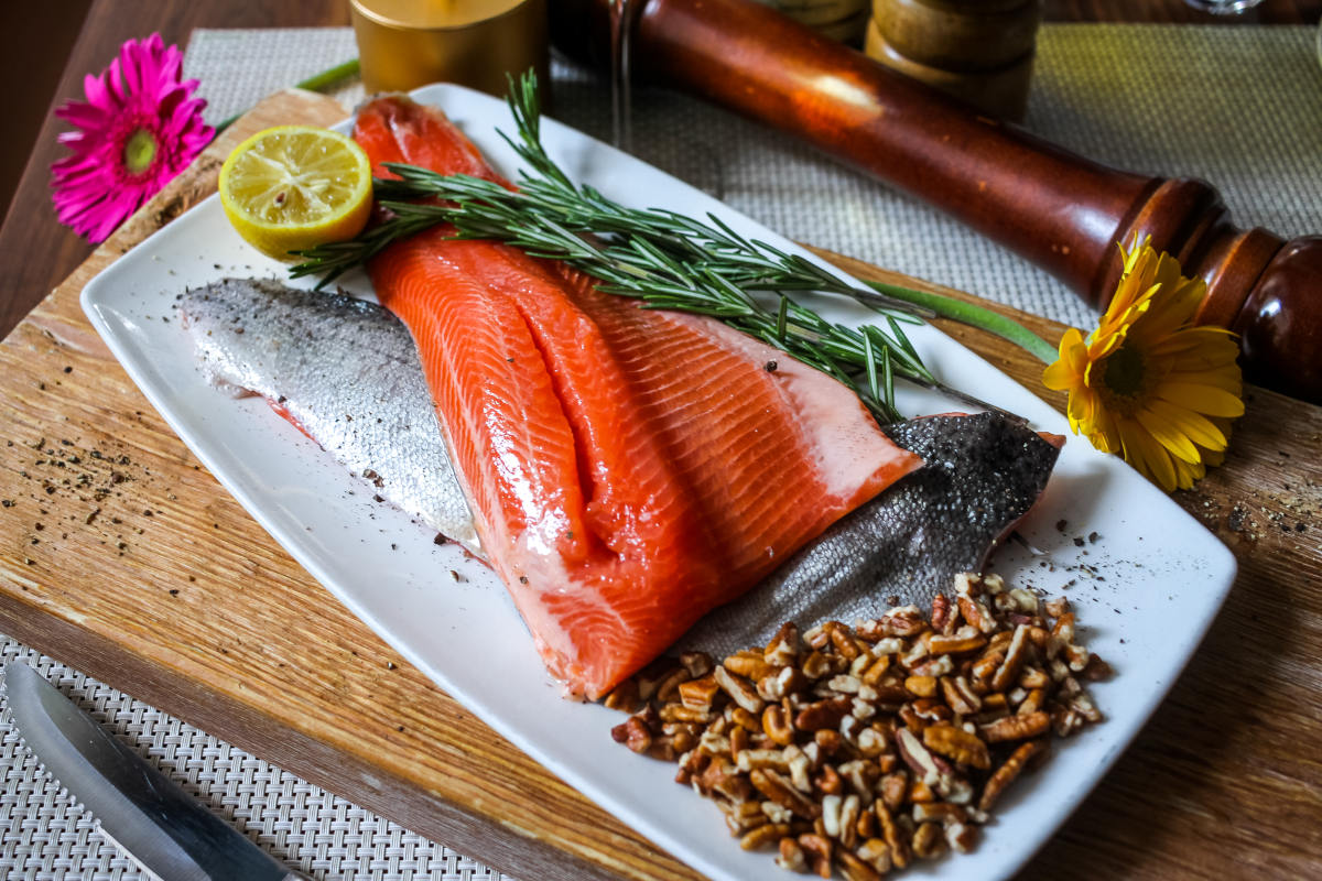 raw ruby red steelhead trout with local pecans